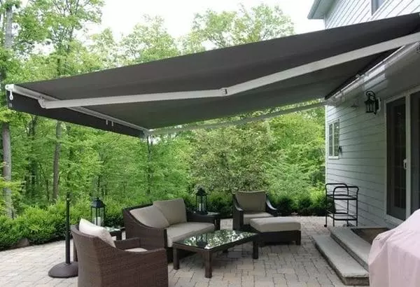 Tolmet toldo brazo invisible para galería