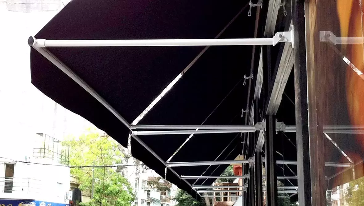 Tolmet toldo brazo recto para local comercial