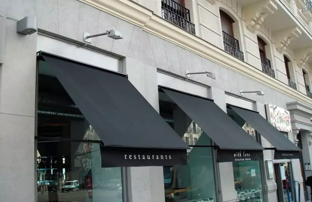 Tolmet toldo brazo recto para negocio